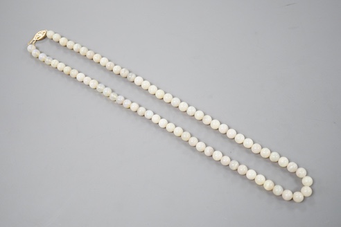 A modern single strand white opal bead necklace, with 585 yellow metal clasp, 44cm.